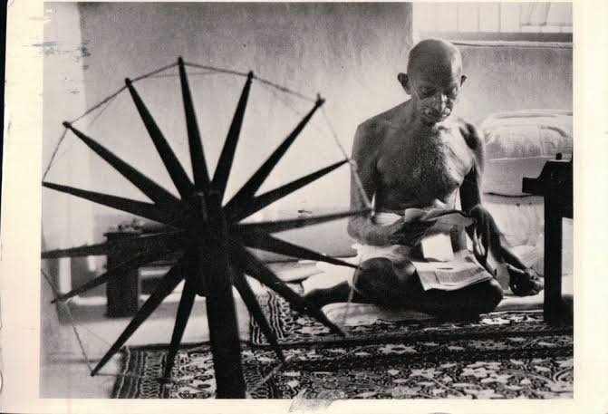 Gandhi spinning with Charakha